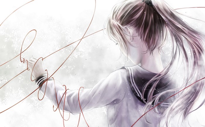 Girl in school uniform with red strings