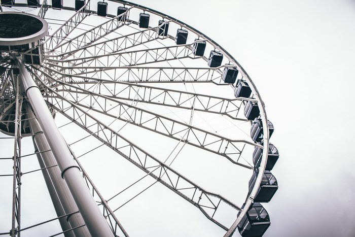Close-up of a Ferris wheel with gondolas