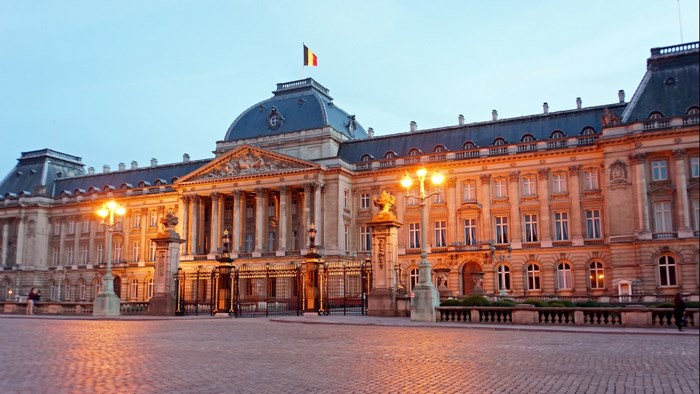 Royal Palace of Brussels with Belgian Flag