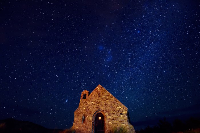 Church of the Good Shepherd under a starry night sky