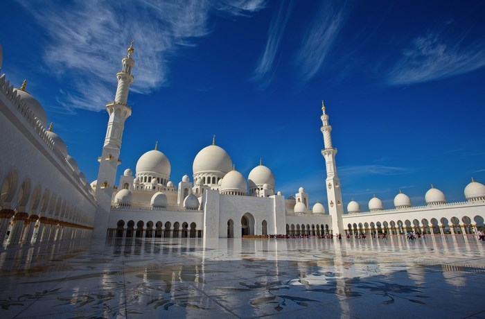 Sheikh Zayed Grand Mosque courtyard with minarets