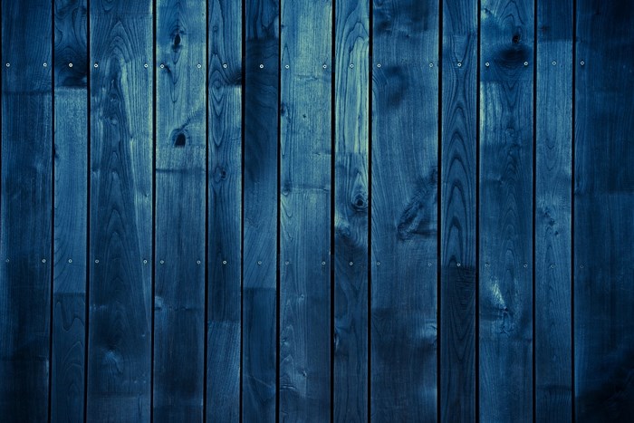 Dark blue wooden planks with visible grain