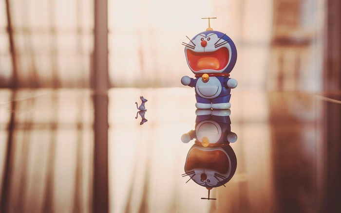 Doraemon toy with a mouse toy