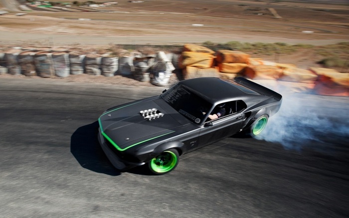 Black Muscle Car Drifting with Green Rims