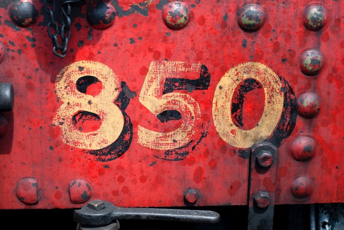 Close-up of the number 850 on a red train car