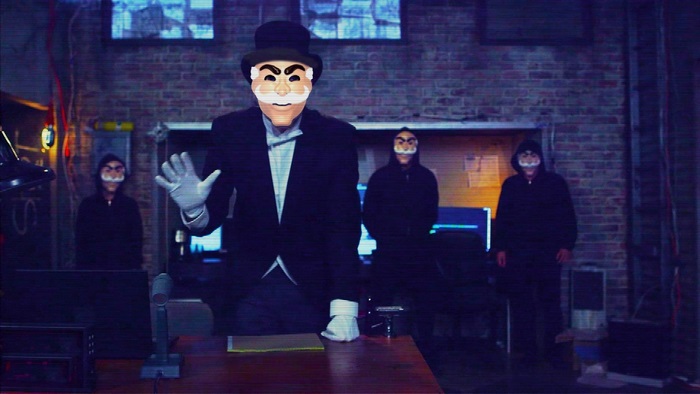 Mr. Robot characters in masks in a room