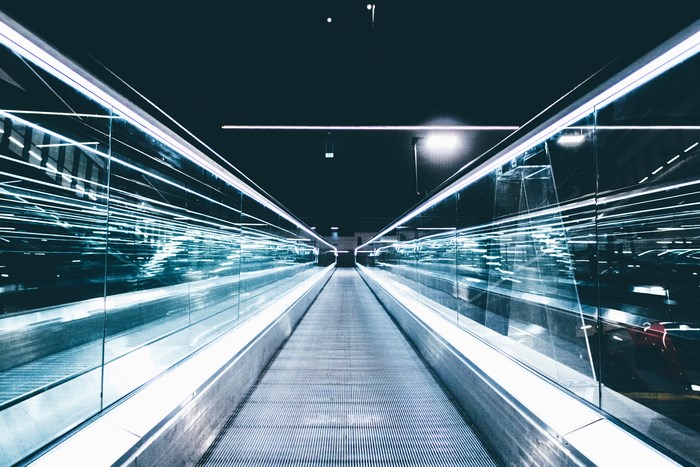 Futuristic travelator with light streaks in Lodz, Poland