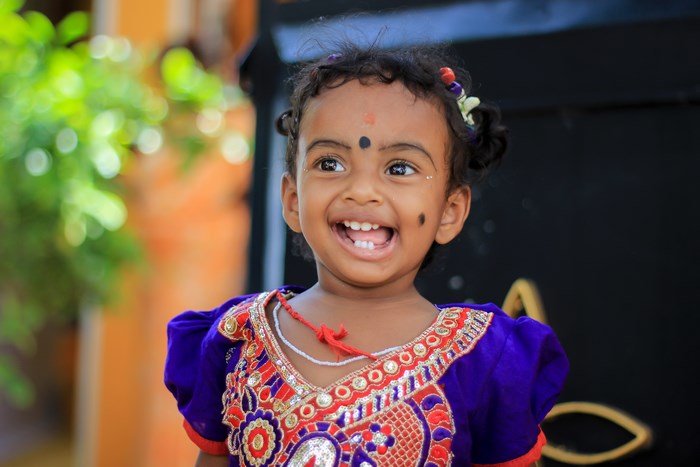 Happy Indian child in traditional dress