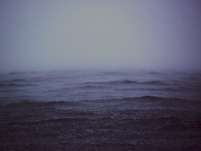 Dark Sea with Rain and Fog