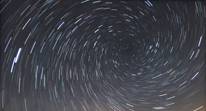 Star trails in a spiral pattern in the night sky