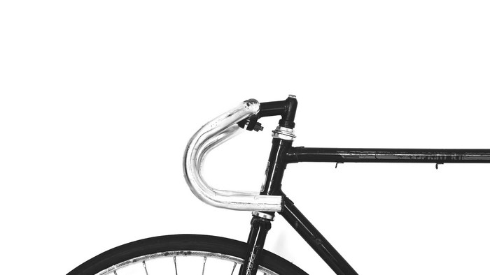 Black and white detail of a bicycle handlebar