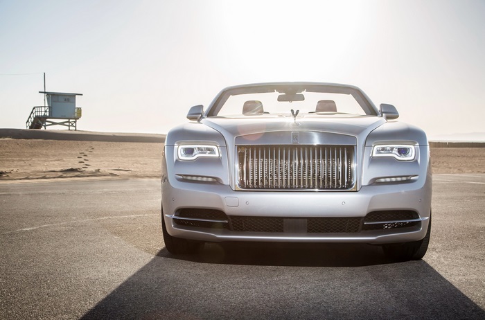 Rolls-Royce Dawn convertible on beach road
