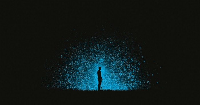 Silhouette against blue explosion 4K