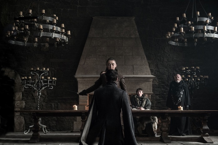 Arya Stark from Game of Thrones in a dark hall