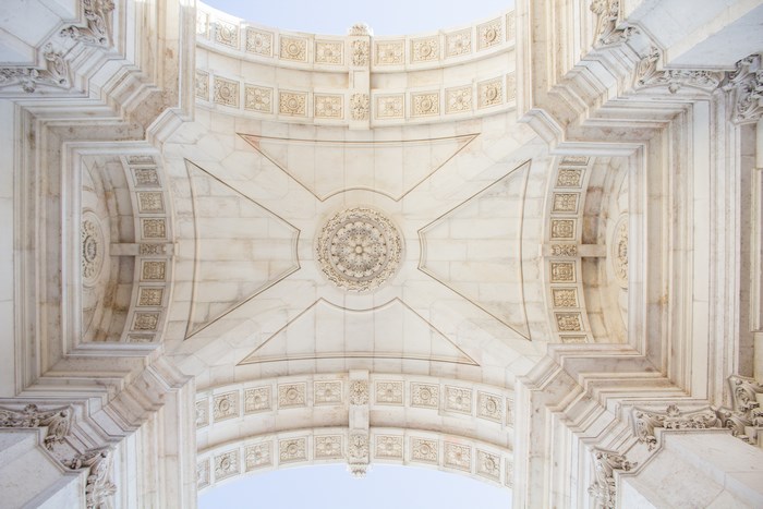 Ornate stone arch ceiling with intricate carvings