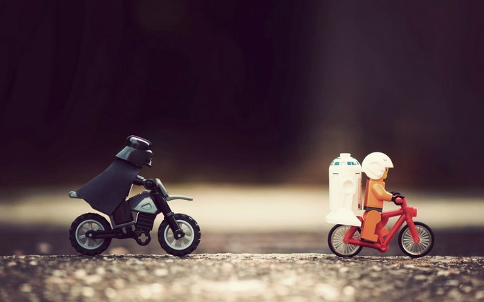 Darth Vader and R2-D2 from Star Wars on motorcycles