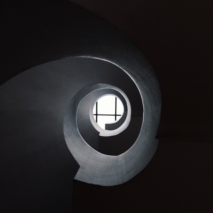Spiral staircase with a window in the center
