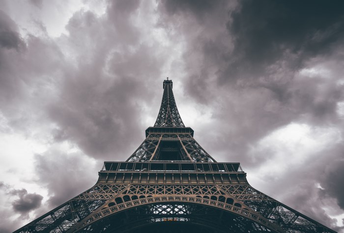 Eiffel Tower under a cloudy sky
