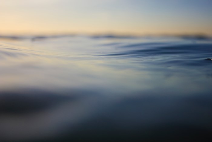 Abstract close-up of calm water at sunset