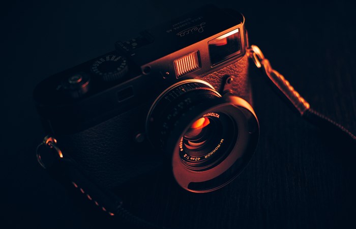 Leica M9-P camera with Minolta lens and strap