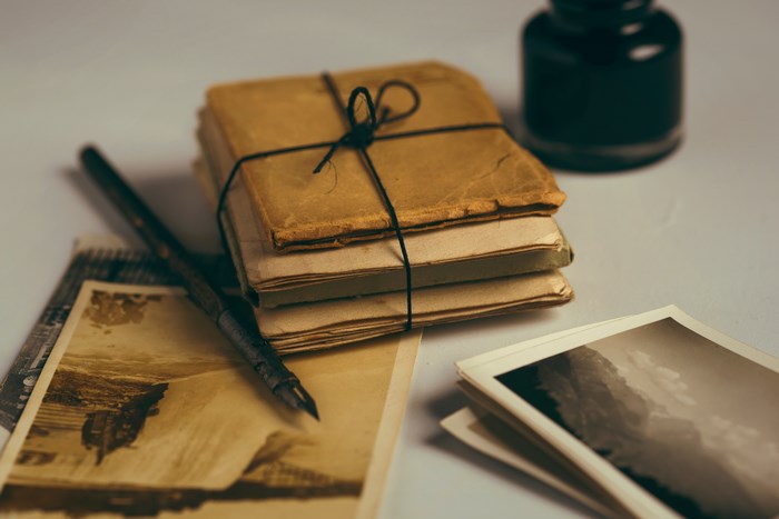 Vintage Letters, Fountain Pen, and Ink Pot Still Life