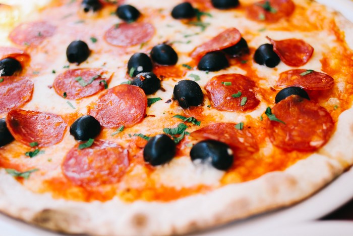 Pepperoni and Olive Pizza with Fresh Herbs
