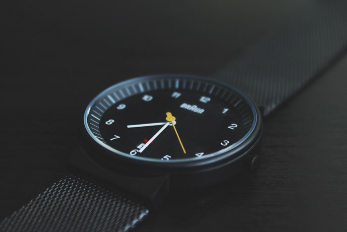Braun minimalist analog watch with black mesh strap