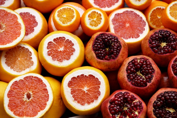 Grapefruits, Oranges, and Pomegranates on Display