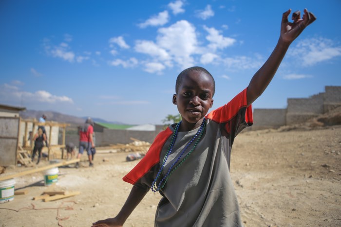 African boy with necklace in Haiti