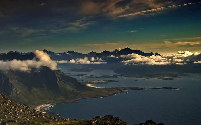 Mountainous coastline with clouds over the sea