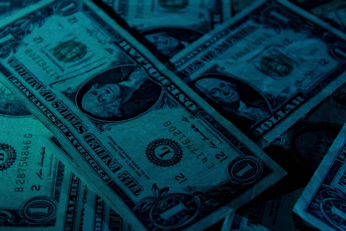 US Dollar Bills Scattered