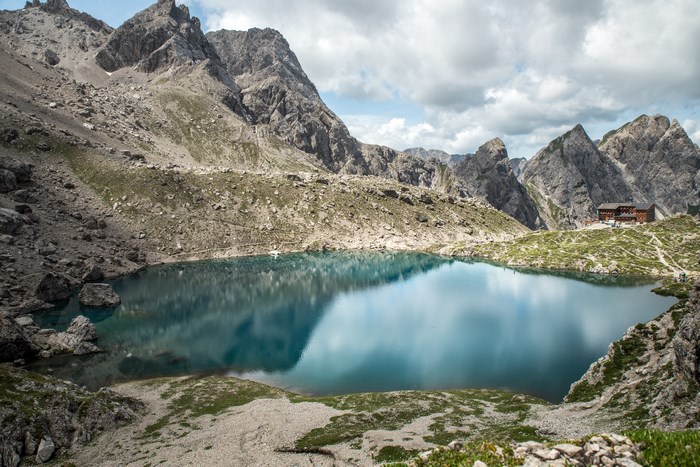 Mountain lake with a lodge in the background
