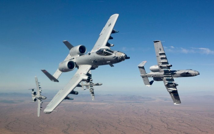Four Fairchild Republic A-10 Thunderbolt II aircraft in flight