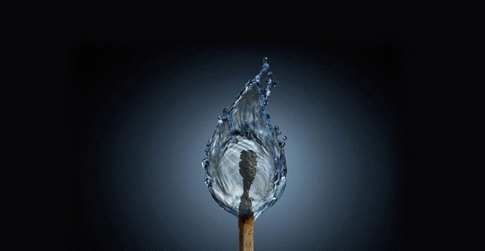 Water splash around a burning match