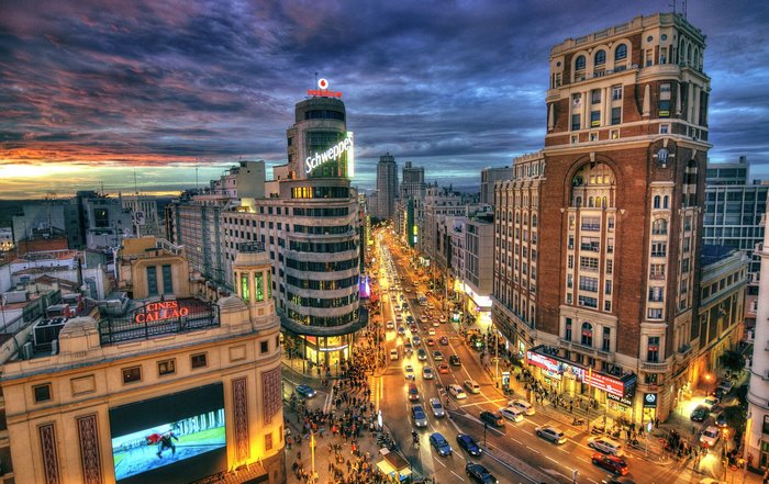 Madrid cityscape at sunset with Schweppes building
