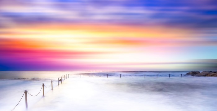 Abstract Seascape with Colorful Sunrise and Ocean Pool