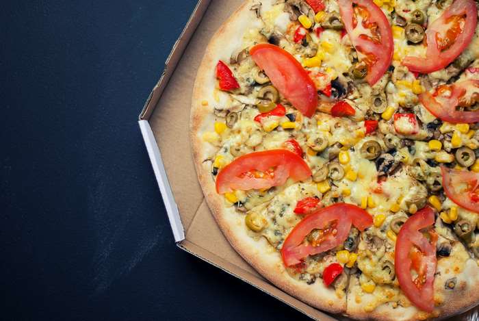 Vegetable pizza in a delivery box 4K