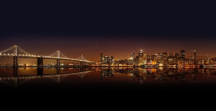 San Francisco Bay Bridge and Cityscape at Night