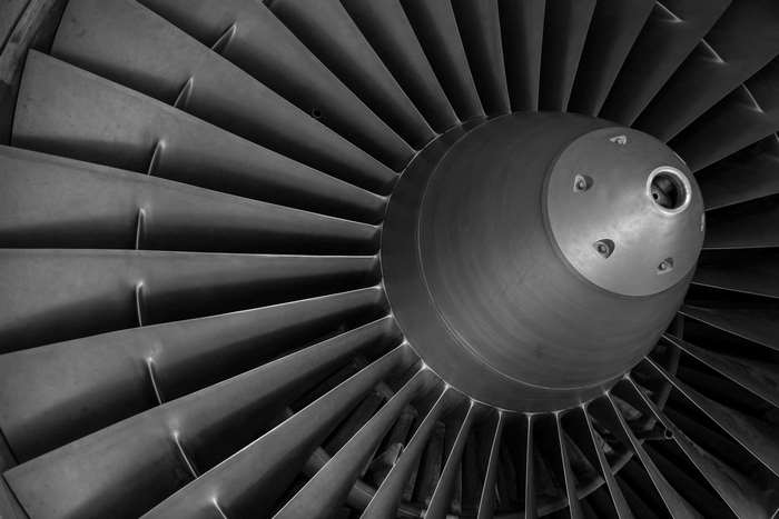 Close-up of a jet engine fan and rotor blades
