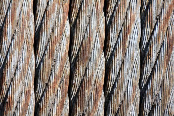 Close-up of Rusty Braided Steel Cables Texture 4K