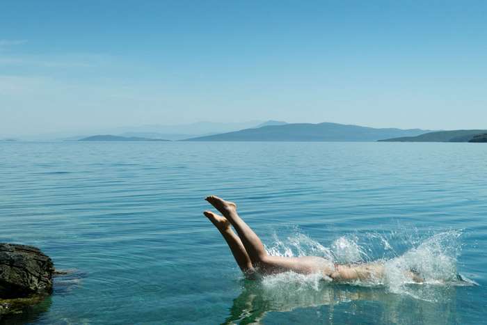 Person diving into the sea