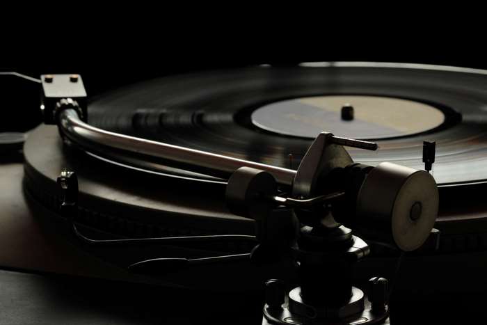 Close-up of a vintage record player with vinyl