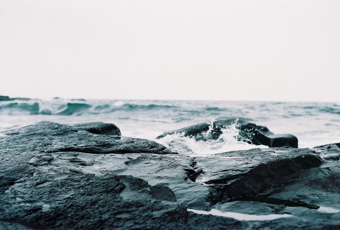 Waves crashing on rocks at the coast