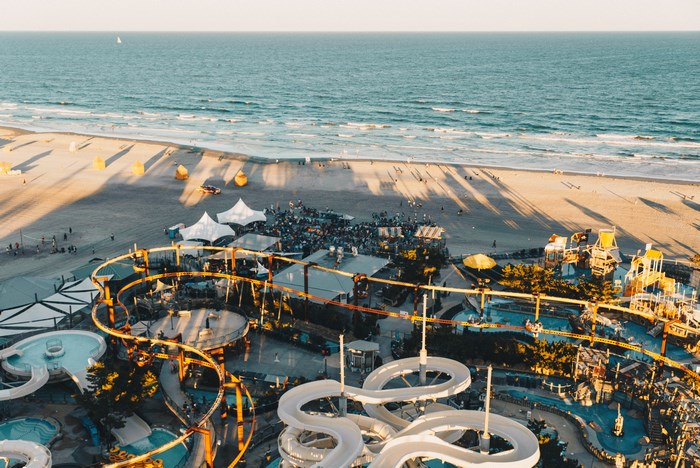 Waterpark and Beachfront with Crowd and Tents