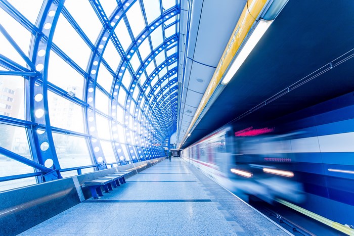 Metro station in Prague with a moving train