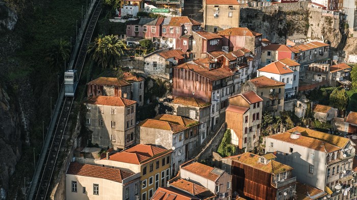 Funicular ascending a steep hillside in Porto, Portugal