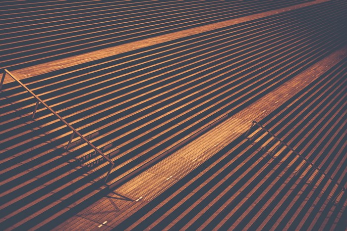 Golden stairs with shadows at night in Paris
