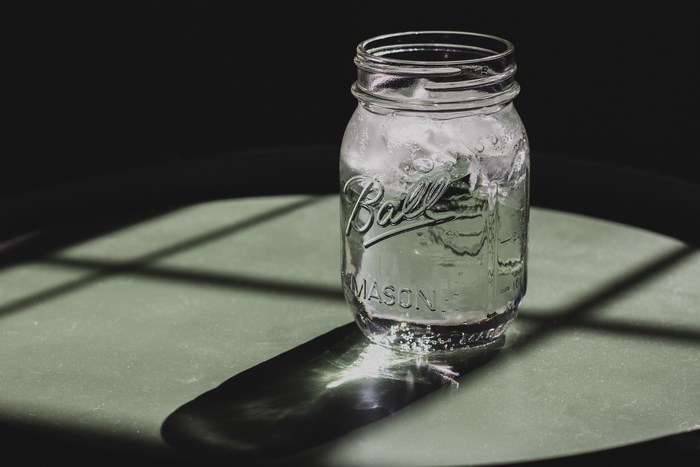 Ball Mason Jar with Ice Water and Shadows