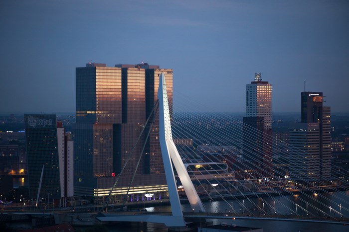 Erasmus Bridge and skyscrapers at dusk in Rotterdam