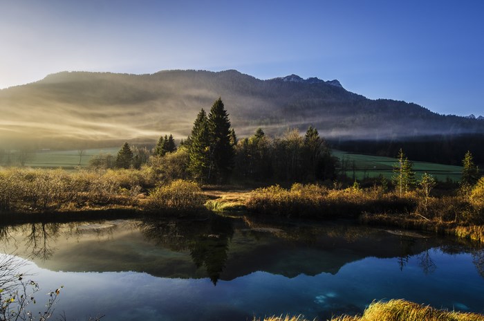 Misty Mountain Lake Reflection at Sunrise